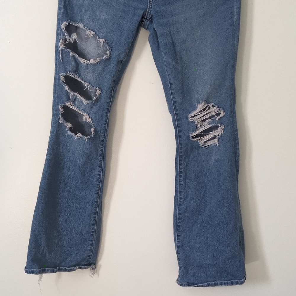 Women's Distressed Blue Jeans